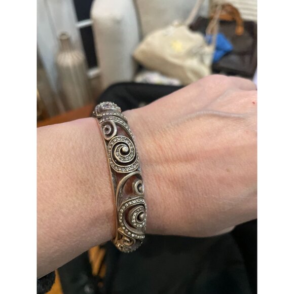 This is a Brighton Anahita silver-plated scrolled hinged bangle bracelet with Sw - Picture 5 of 8